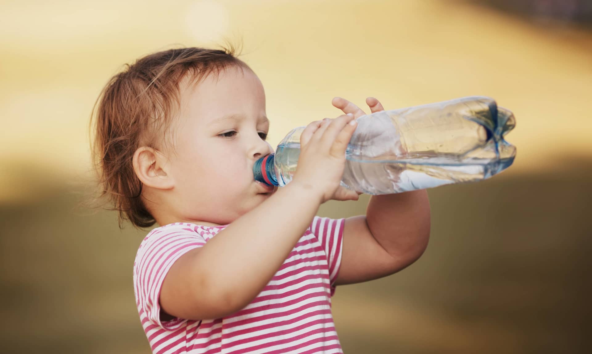 Baby drinking pure water